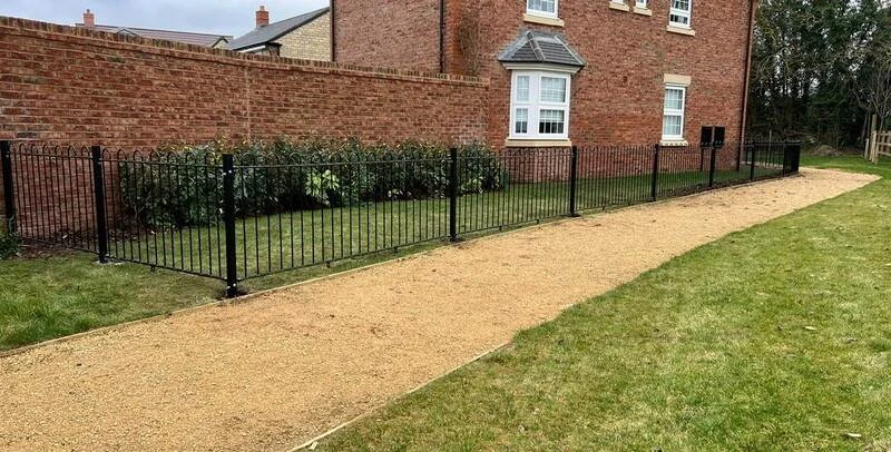 Bow-top railings as a boundary fence